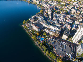 High angle view of buildings by sea