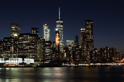 Illuminated city lit up at night