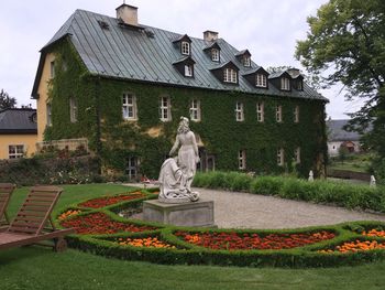 Low angle view of statue against sky