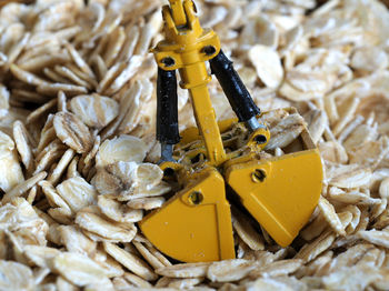 High angle view of yellow machine part