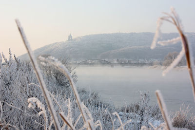 Scenic view of frozen lake against sky