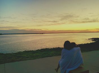 Scenic view of sea at sunset