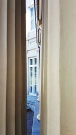 Narrow alley amidst buildings in city