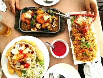 High angle view of food served on table