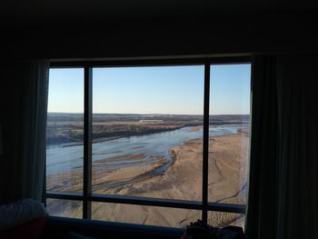 Scenic view of sea seen through window