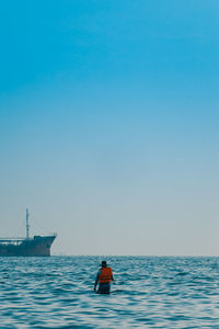 Scenic view of sea against clear sky