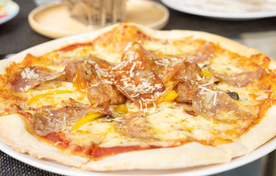 Close-up of pizza served in plate