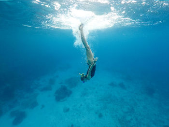 Woman swimming in sea