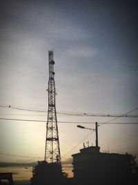 Low angle view of electricity pylon