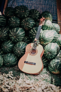 Guitar and lots of watermelons in the summer. hippie and freedom concept