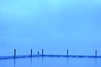 View of pier on calm sea