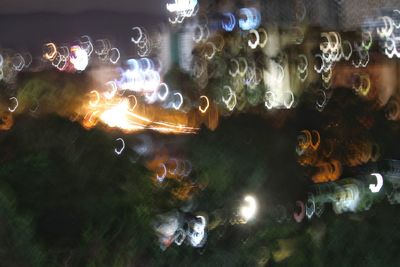 Close-up of bubbles at night