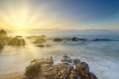 Scenic view of sea against sky during sunset