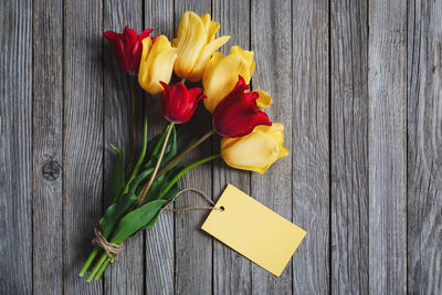 High angle view of yellow tulip on table