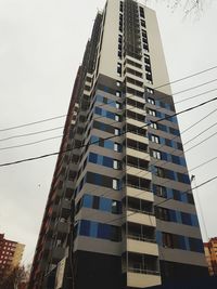 Low angle view of modern buildings against clear sky