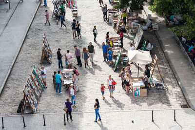 High angle view of crowd with booksellers at plaza de armas