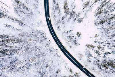 High angle view of snow covered trees against sky