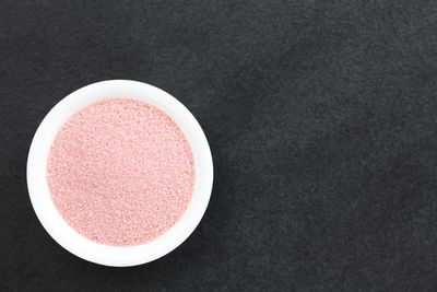 High angle view of red bowl on table