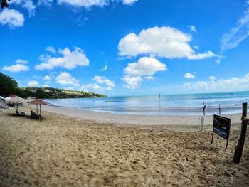 Scenic view of beach against sky