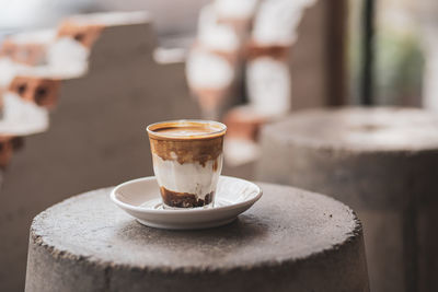 Close-up of coffee served on table