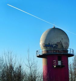 Low angle view of built structure against blue sky