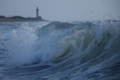 View of waves splashing on beach