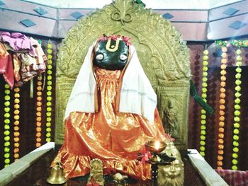 Close-up of statue against temple