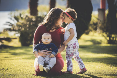 Full length of mother with girl