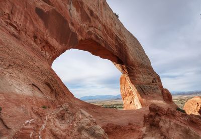 Scenic view of rock formation against sky