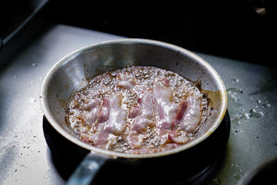 High angle view of meat in cooking pan