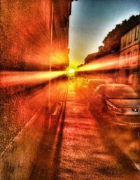 Car on street in city at sunset