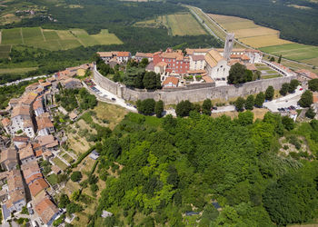 High angle view of buildings on field