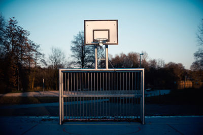 View of basketball hoop and soccer goal against sky