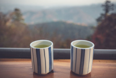 Close-up of coffee cup on table