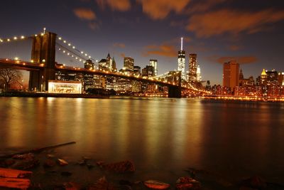 Illuminated city at waterfront