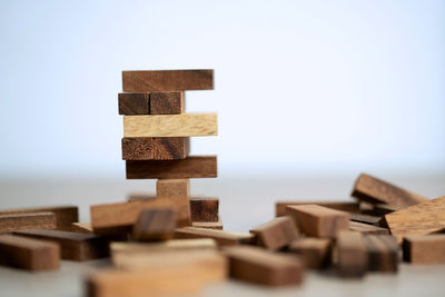 Close-up of stack on wooden table