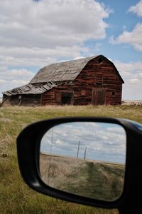 Reflection of field on side-view mirror