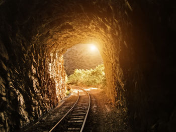 View of railroad tracks in tunnel