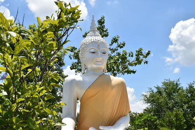 The white buddha in trivisuttitham temple. suphanburi province. thailand.