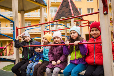 Kids sitting in playground