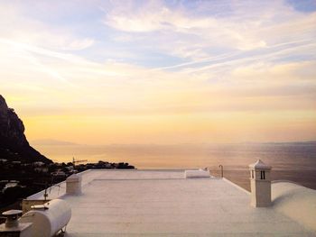 Scenic view of sea at sunset