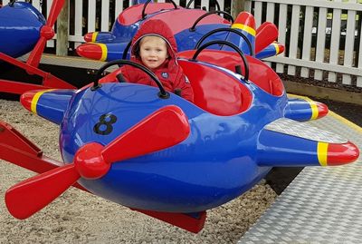 Portrait of boy playing with inflatable ring