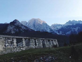 Scenic view of mountains against clear blue sky