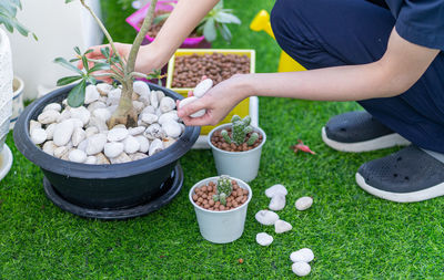 Midsection of man preparing food