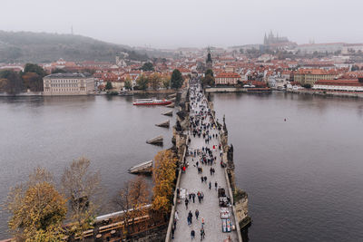 High angle view of river amidst buildings in city