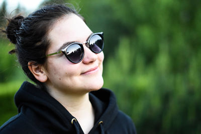 Portrait of smiling mid adult man wearing sunglasses