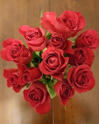 Close-up of pink roses on table