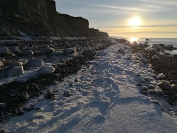 Scenic view of sea against sky during sunset