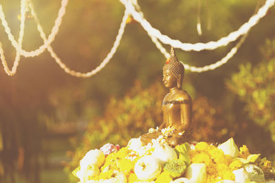 Close-up of statue of flower