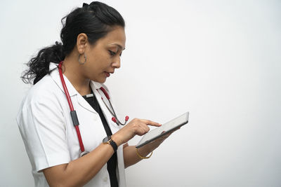 Young woman using mobile phone